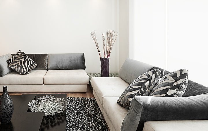 white sunscreen roller blinds in living room