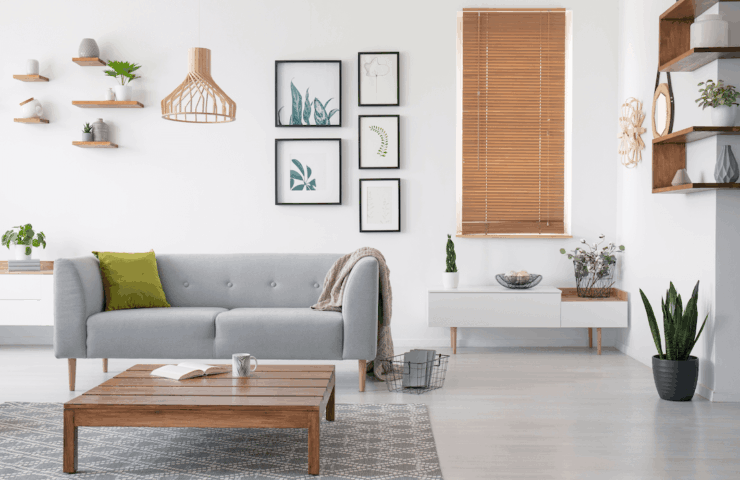 Wooden Blinds in the lounge with grey couch and coffee table