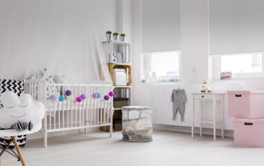 White Roller Blockout blinds in nursery room