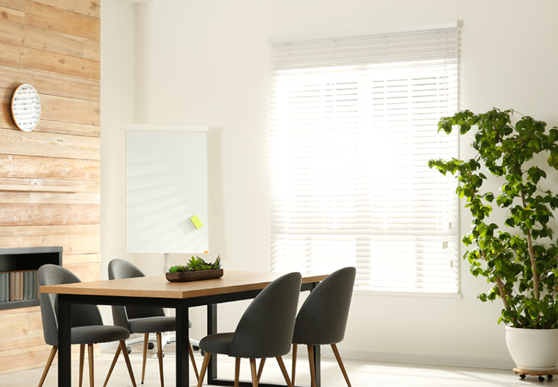 Venetian Faux wood blind in front of dinning room