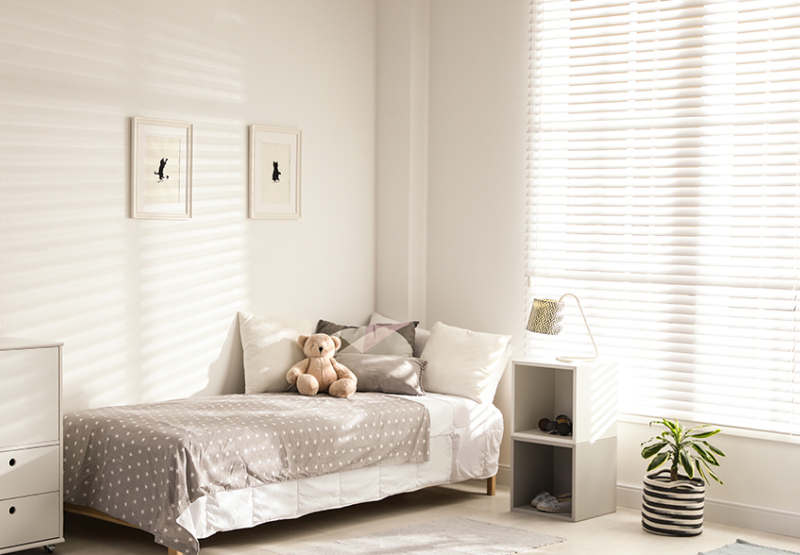 Venetian Faux wood blinds in sunny kid's bedroom