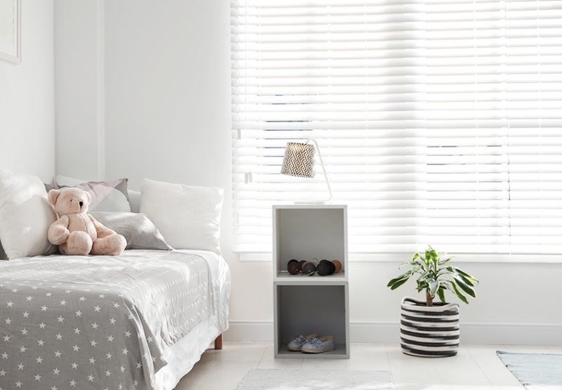 Venetian Faux wood blinds in sunny kid's room